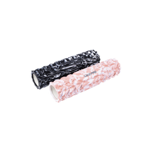 Load image into Gallery viewer, Two foam rollers, one black and one pink, with textured surfaces for massage.